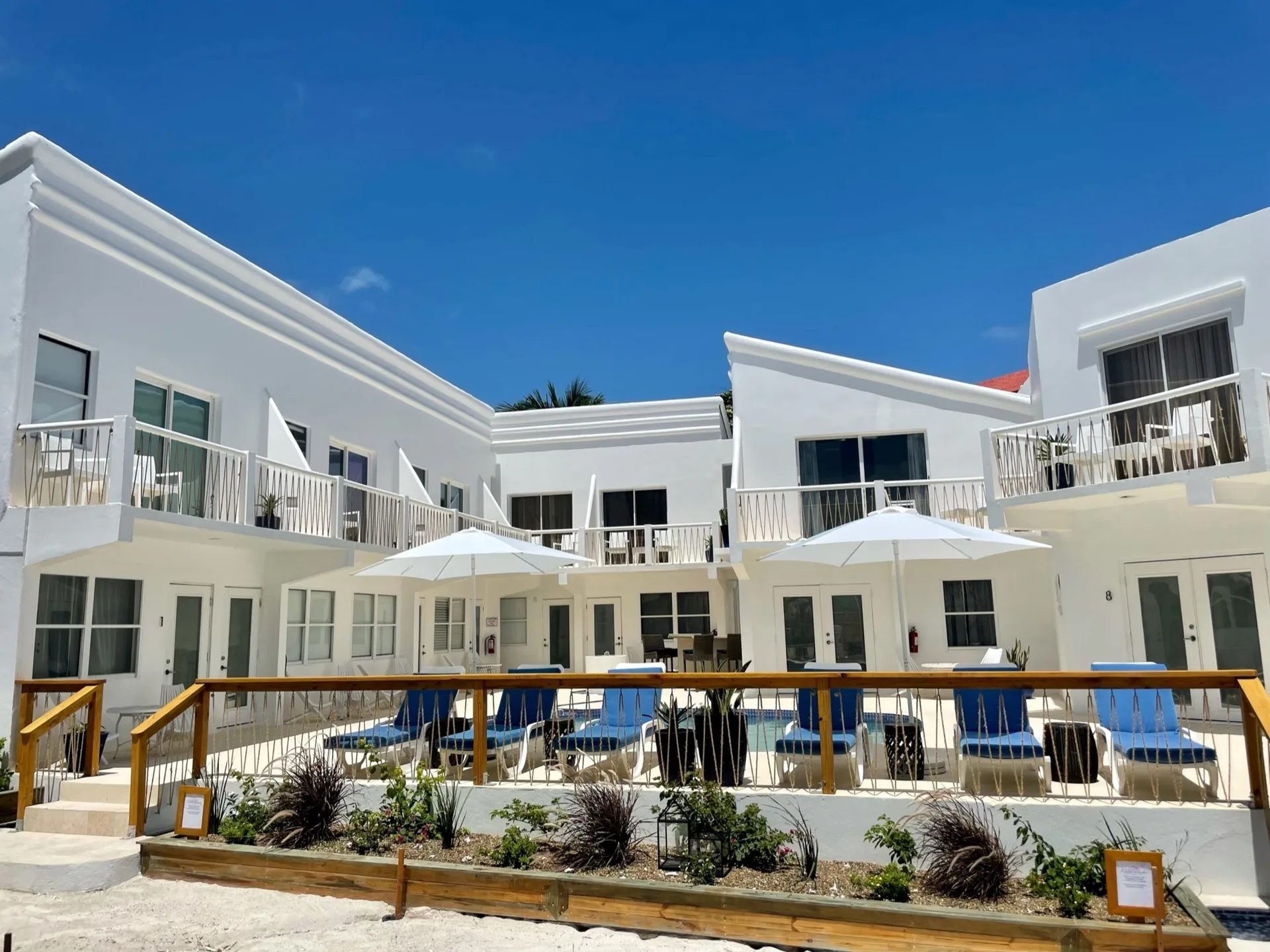 Mata Rocks Resort casual beachfront Belize resort with colorful rooms and beach bar