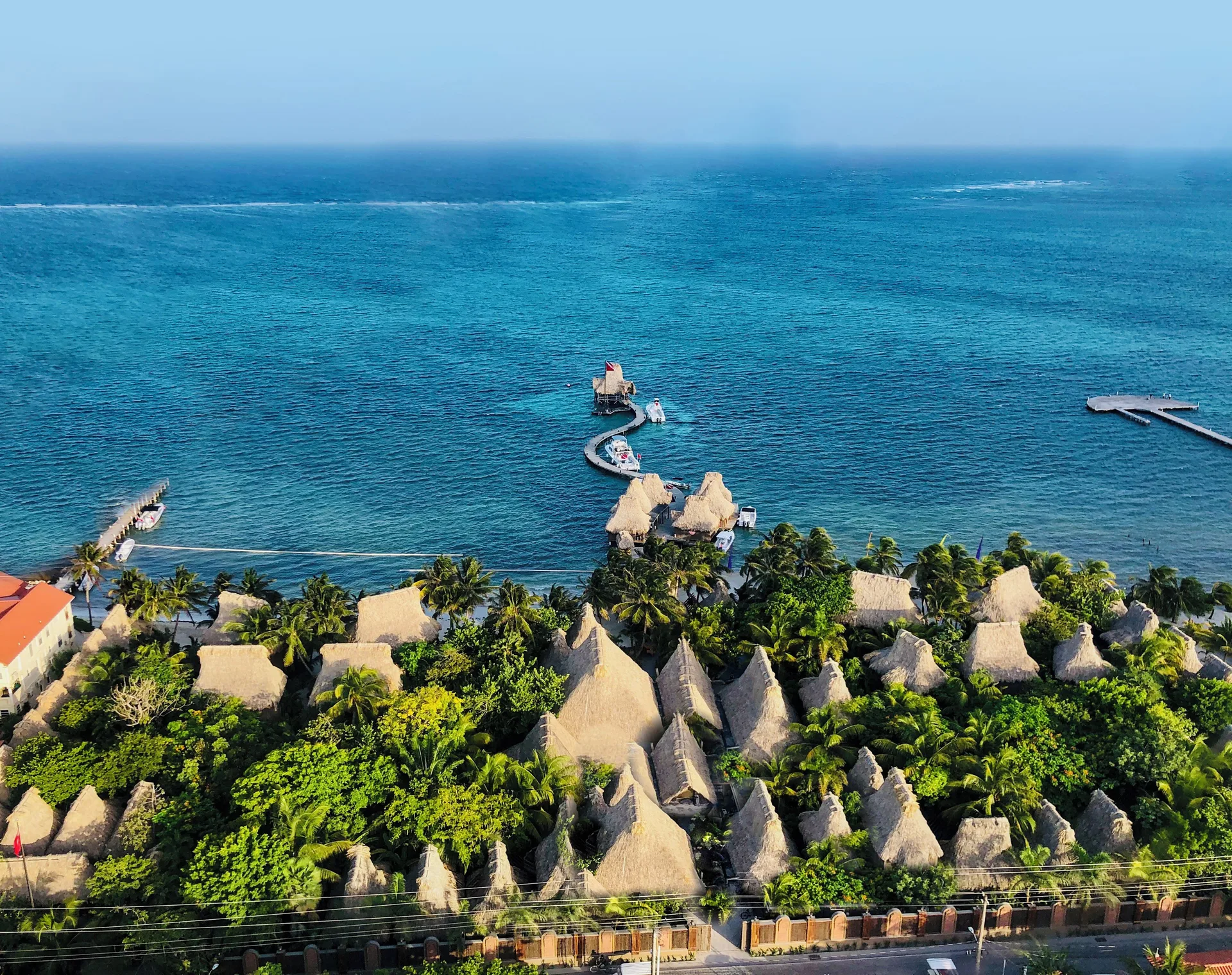 Ramon's Village Resort tropical beachfront Belize resort with thatched cabanas and dive shop