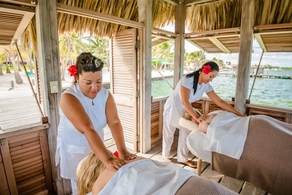 Open-air massage pavilion over the water at Victoria House Resort & Spa.