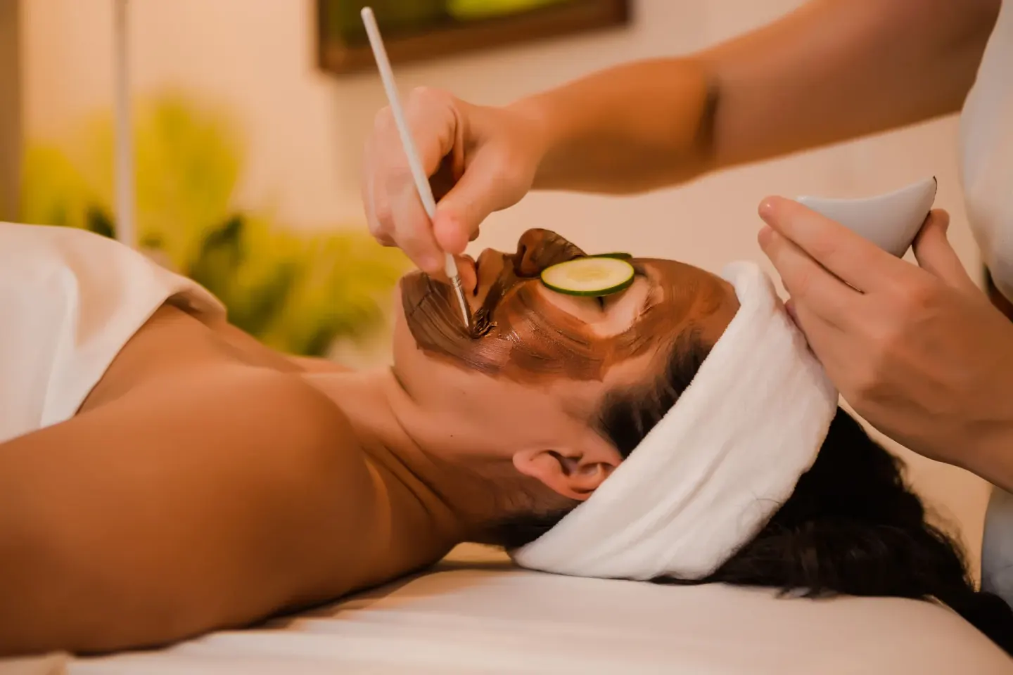 Close-up of a facial mask being applied at Victoria House Resort & Spa.