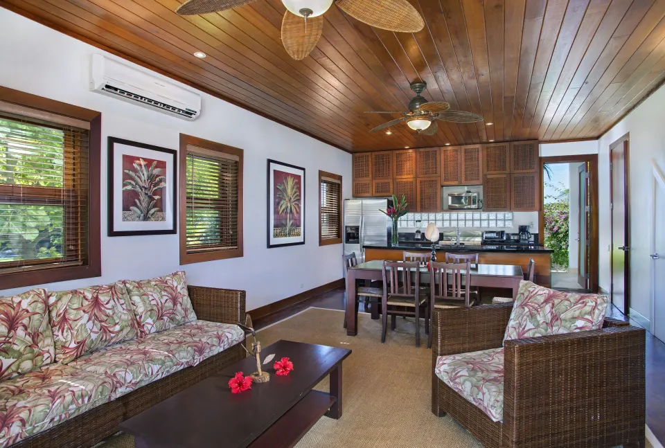One Bedroom Infinity Suite living room and kitchen at Victoria House Resort & Spa.