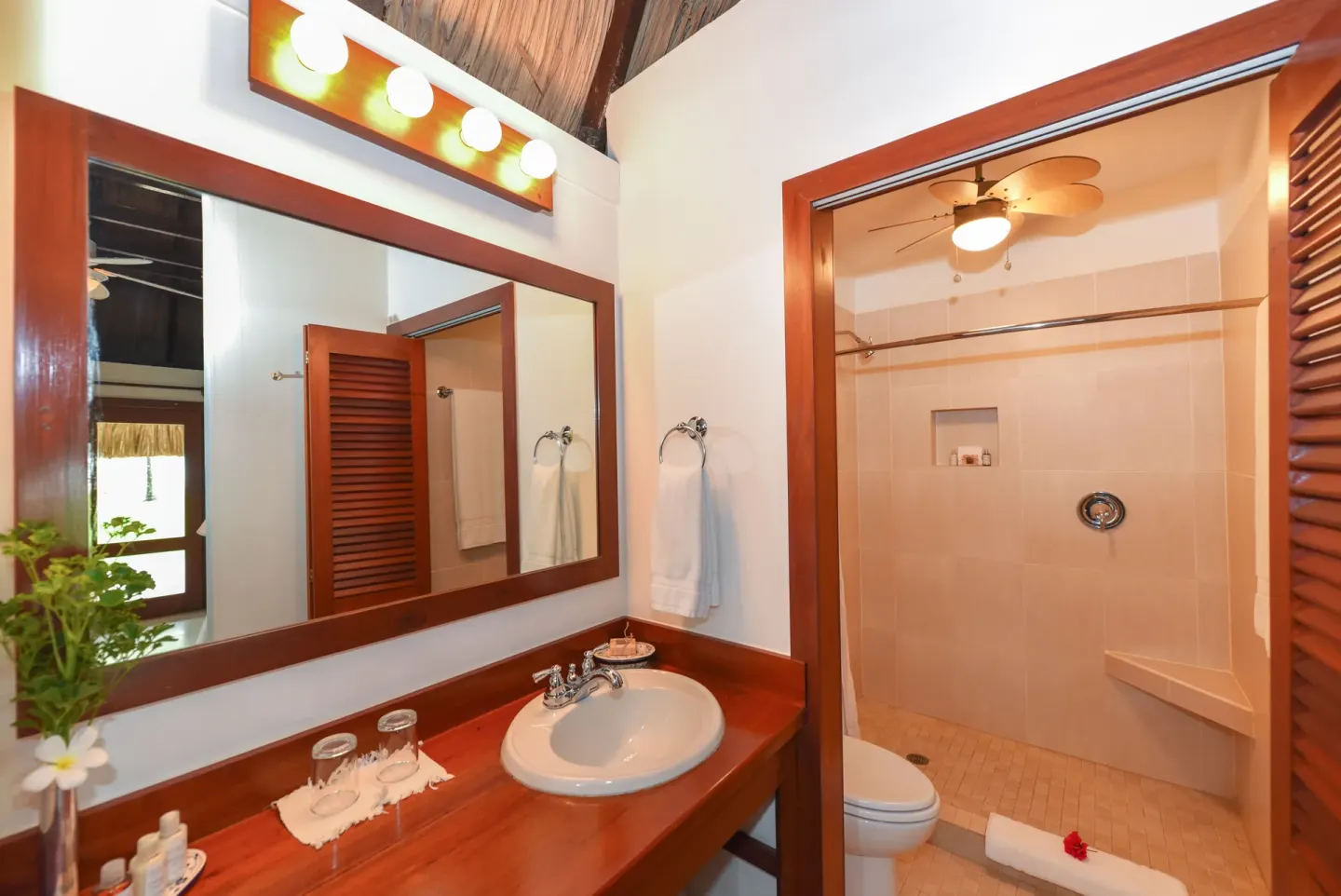 Casita bathroom vanity and walk-in shower at Victoria House Resort & Spa.