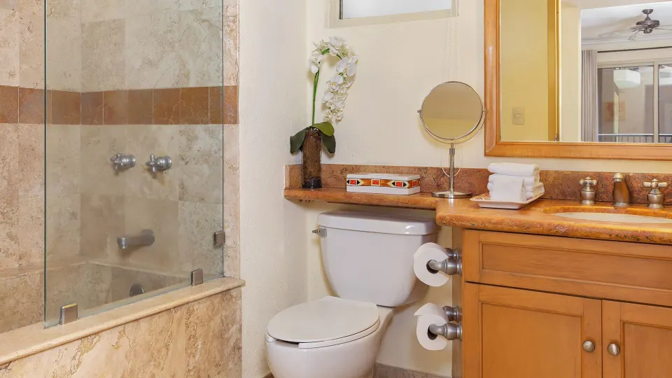 Deluxe Studio Garden View bathroom with tub and vanity at Villa del Arco Beach Resort & Spa Cabo San Lucas.