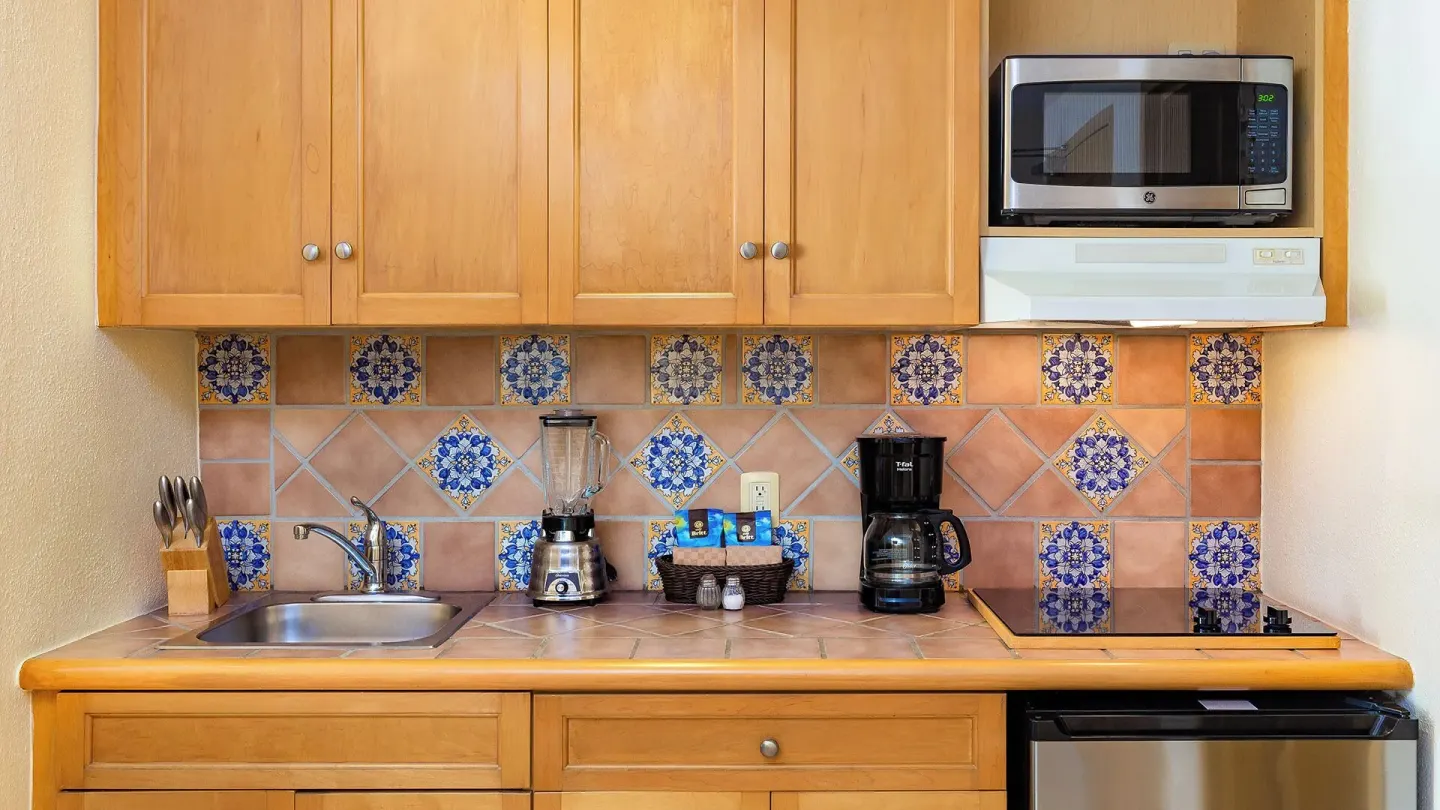 Deluxe Studio Garden View kitchenette with appliances at Villa del Arco Beach Resort & Spa Cabo San Lucas.