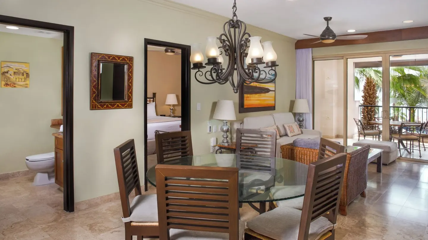 Two Bedroom Suite dining and living area at Villa del Arco Beach Resort & Spa Cabo San Lucas.