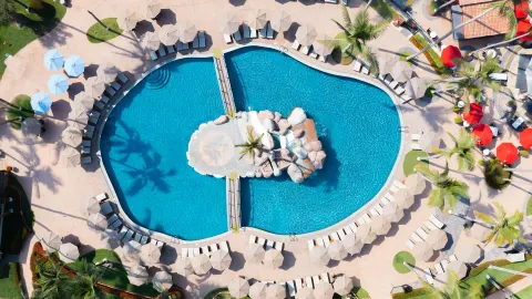 Aerial view of the twin pool layout at Villa del Palmar Beach Resort and Spa, Puerto Vallarta.