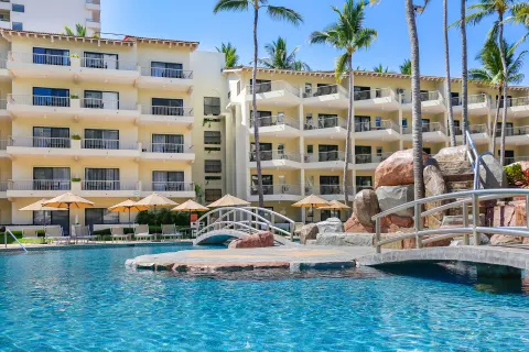 Pool bridge and balconies at Villa del Palmar Beach Resort and Spa, Puerto Vallarta.