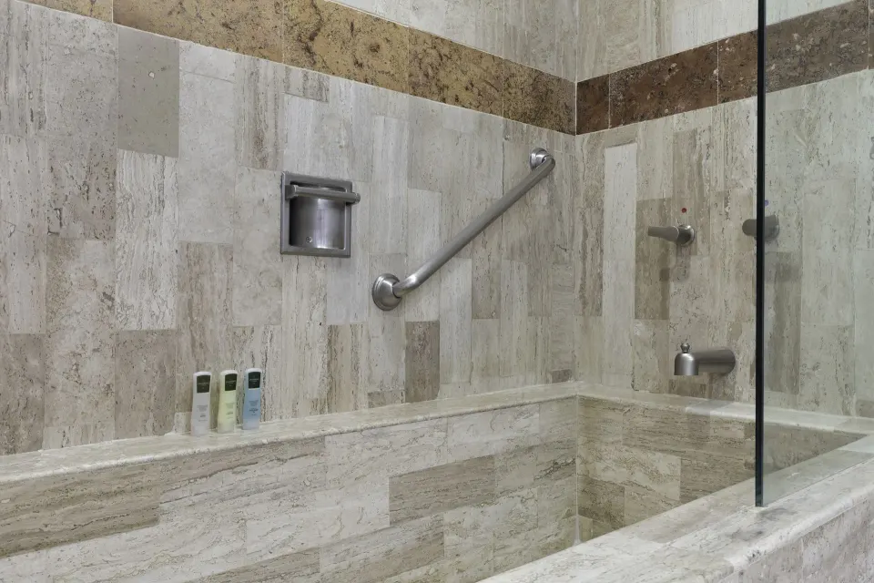Junior Suite bathtub with glass panel at Villa del Palmar Beach Resort and Spa, Puerto Vallarta.