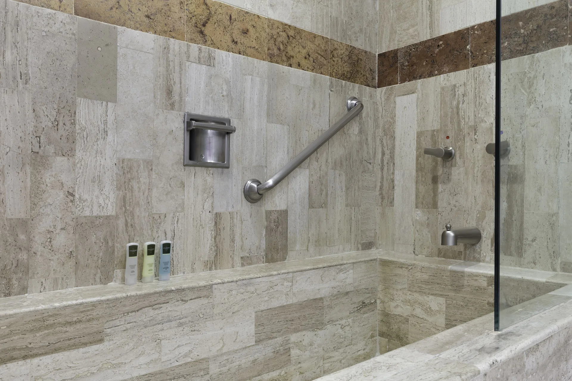 Junior Suite bathtub with glass panel at Villa del Palmar Beach Resort and Spa, Puerto Vallarta.