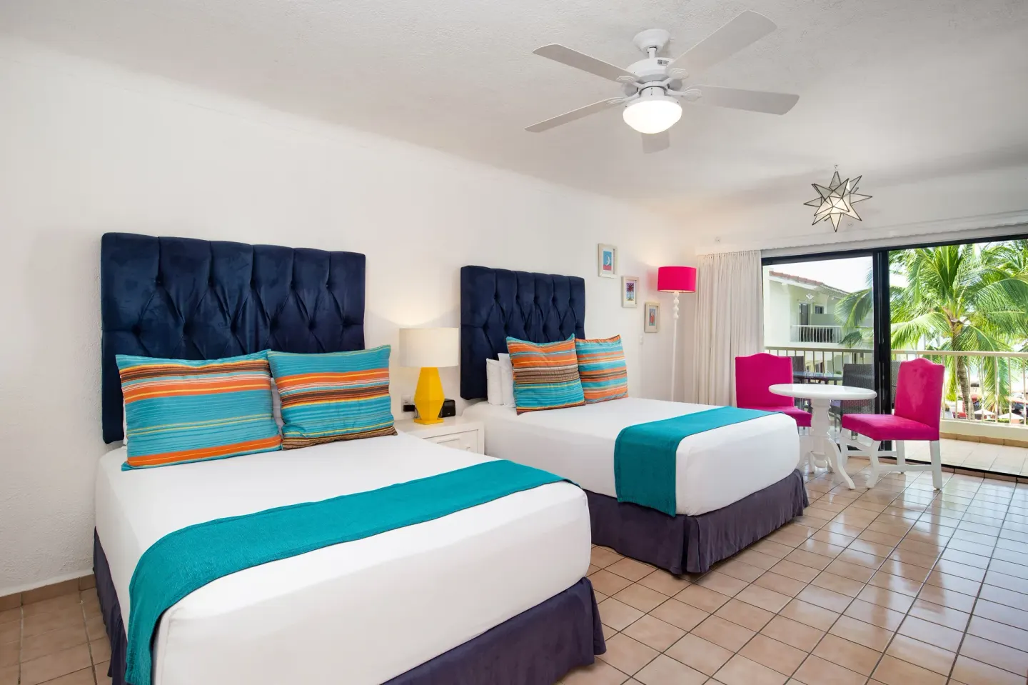 Junior Suite with two beds and balcony at Villa del Palmar Beach Resort and Spa, Puerto Vallarta.
