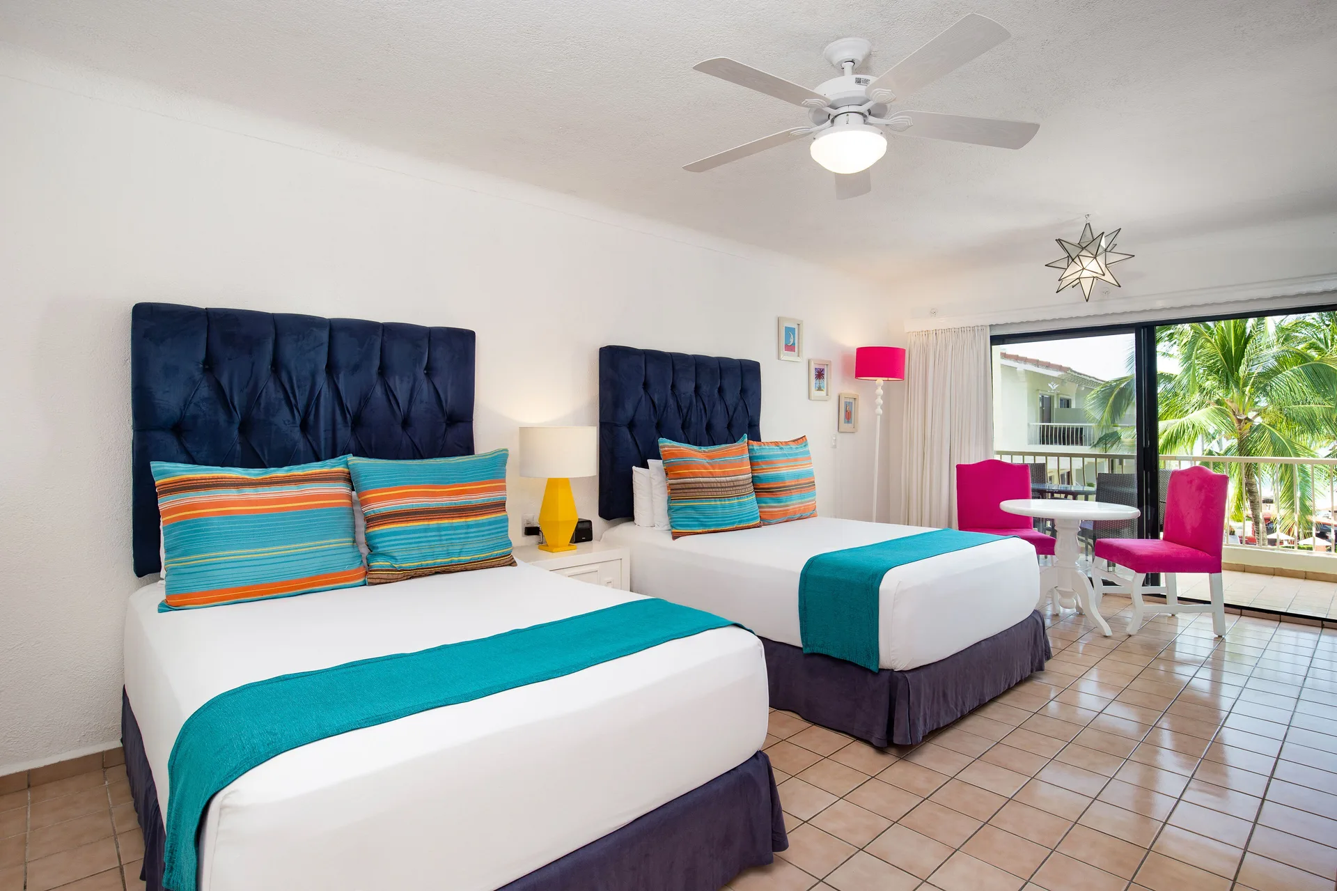 Junior Suite with two beds and balcony at Villa del Palmar Beach Resort and Spa, Puerto Vallarta.