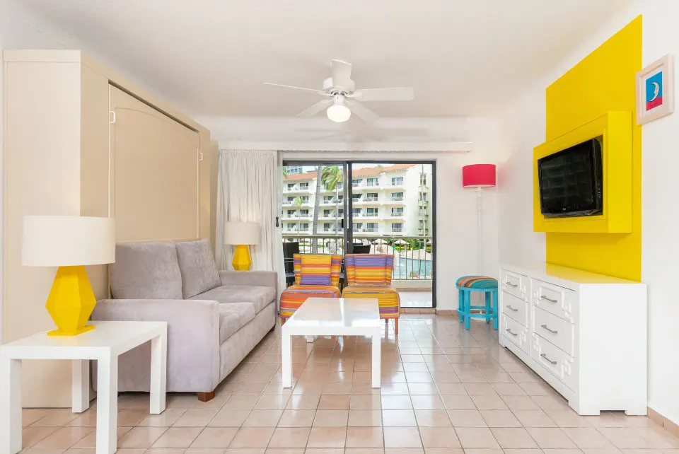 Superior Two Bedroom Suite living room and balcony at Villa del Palmar Beach Resort and Spa, Puerto Vallarta.