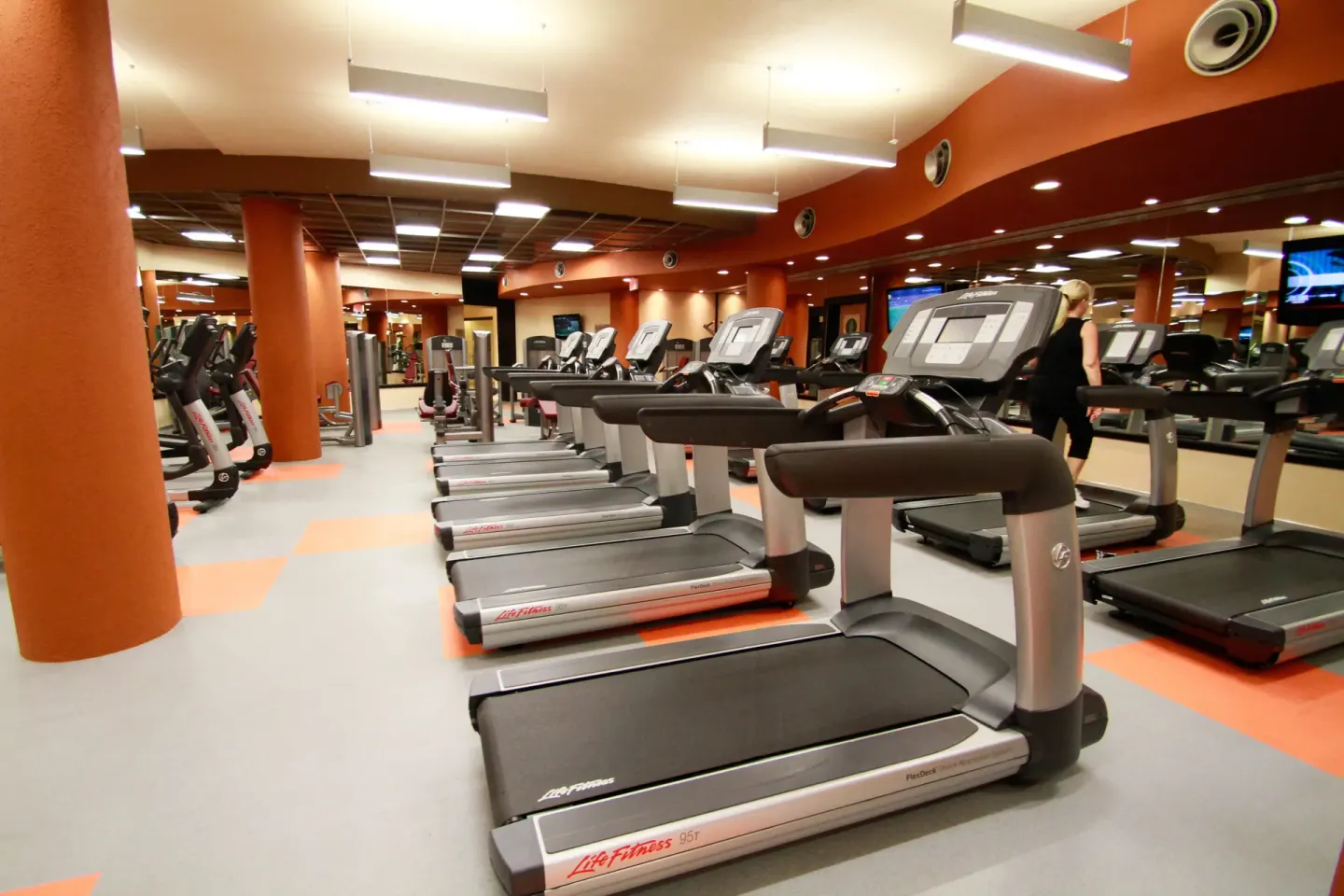 Fitness center with rows of treadmills at Villa del Palmar Cancun Beach Resort & Spa.