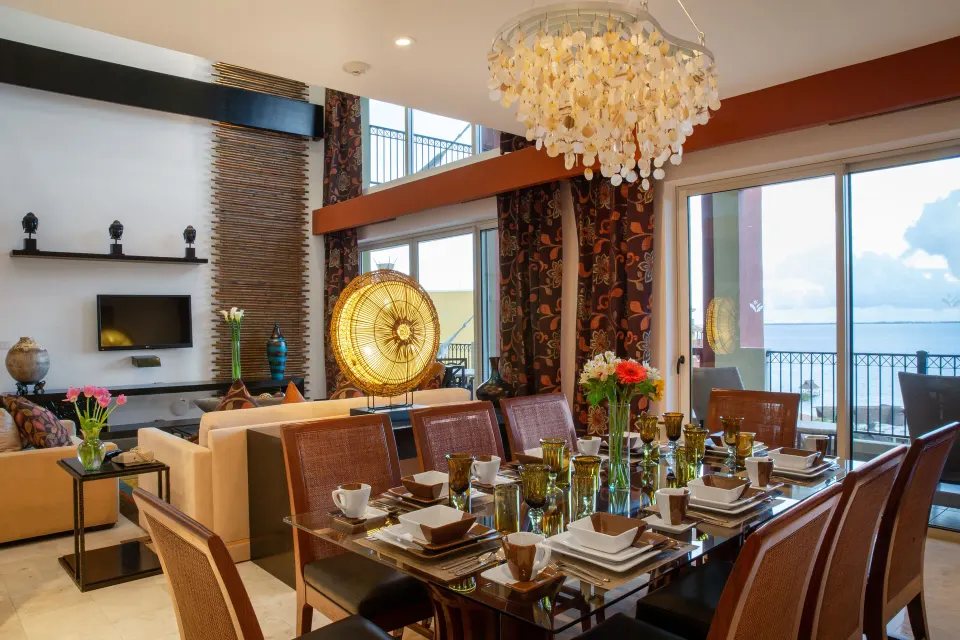 Three Bedroom Loft dining area set for guests at Villa del Palmar Cancun Beach Resort & Spa.