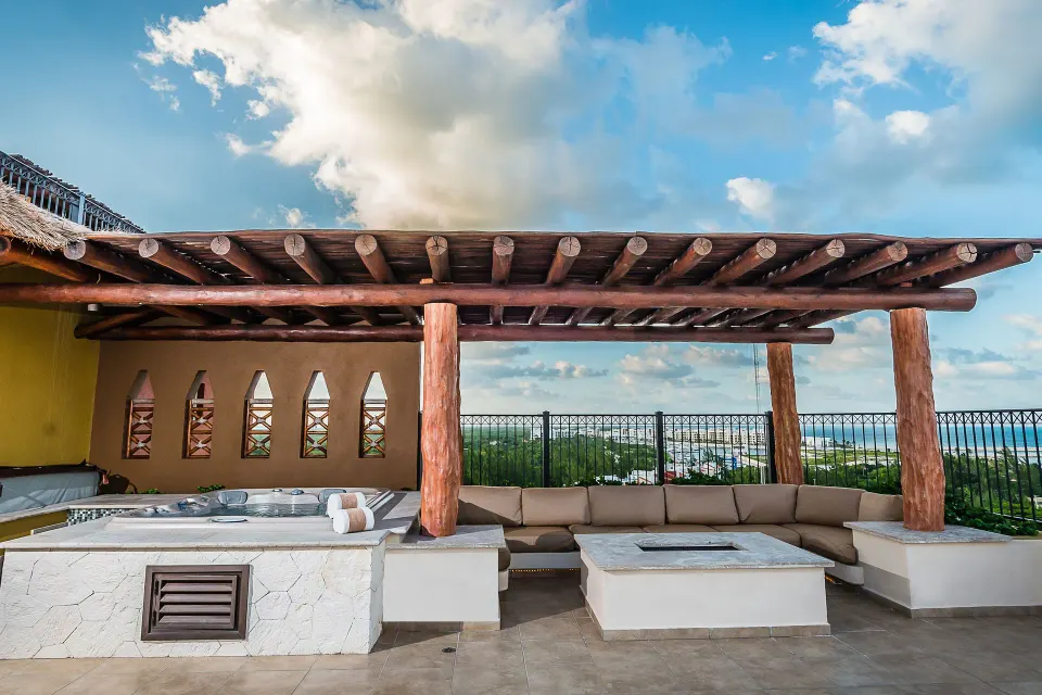 Covered terrace seating in the Two Bedroom Penthouse at Villa del Palmar Cancun Beach Resort & Spa.