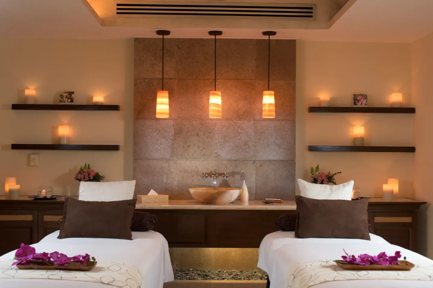 Couples massage room with two treatment beds at Villa Del Palmar Flamingos Beach Resort and Spa.