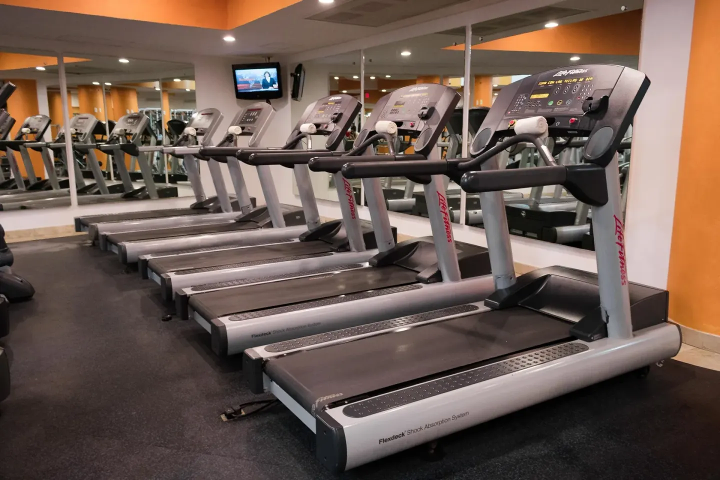 Row of treadmills in the fitness center at Villa Del Palmar Flamingos Beach Resort and Spa.