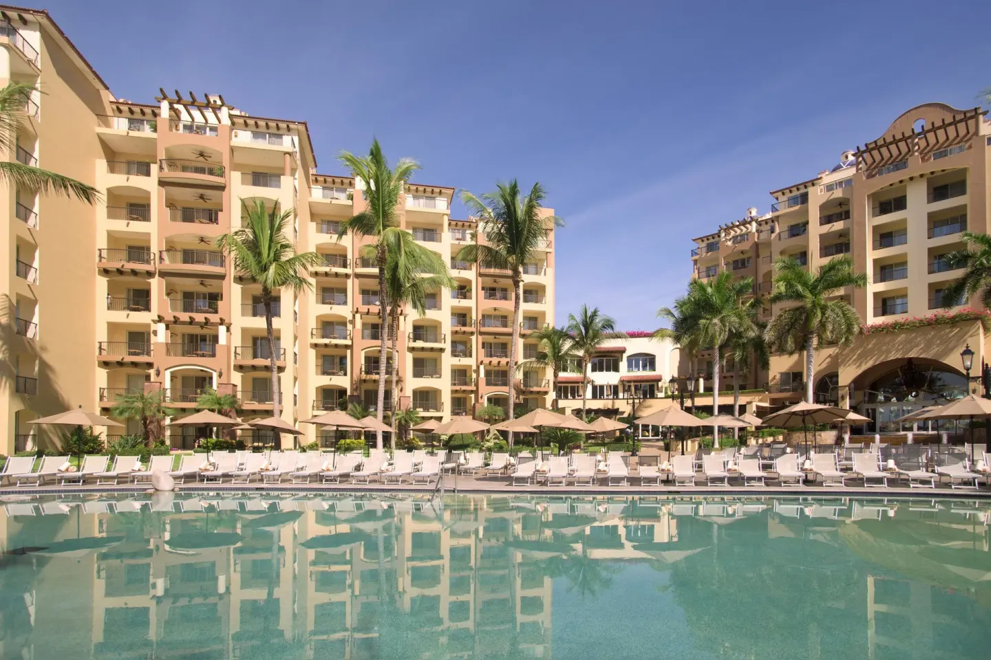 Main pool courtyard and resort buildings at Villa Del Palmar Flamingos Beach Resort and Spa.