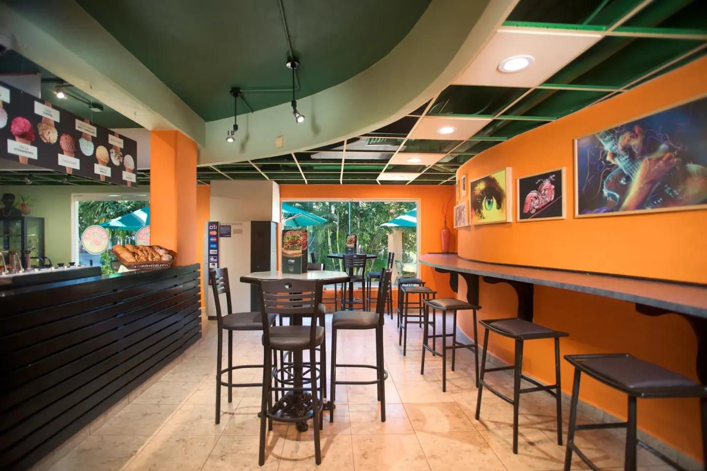 Casual cafe seating and counter at Villa Del Palmar Flamingos Beach Resort and Spa.
