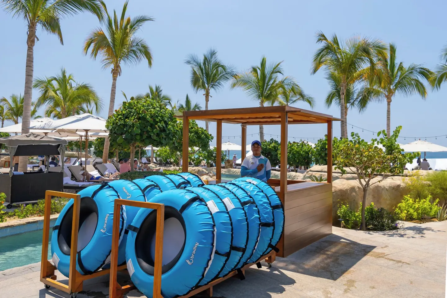 Blue inner tubes at the lazy river station at Villa La Valencia Los Cabos Beach Resort & Spa.