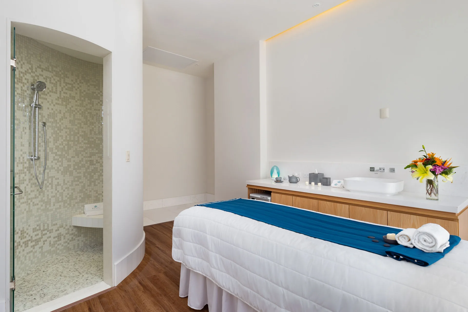 Spa treatment room with massage table at Villa La Valencia Los Cabos Beach Resort & Spa.