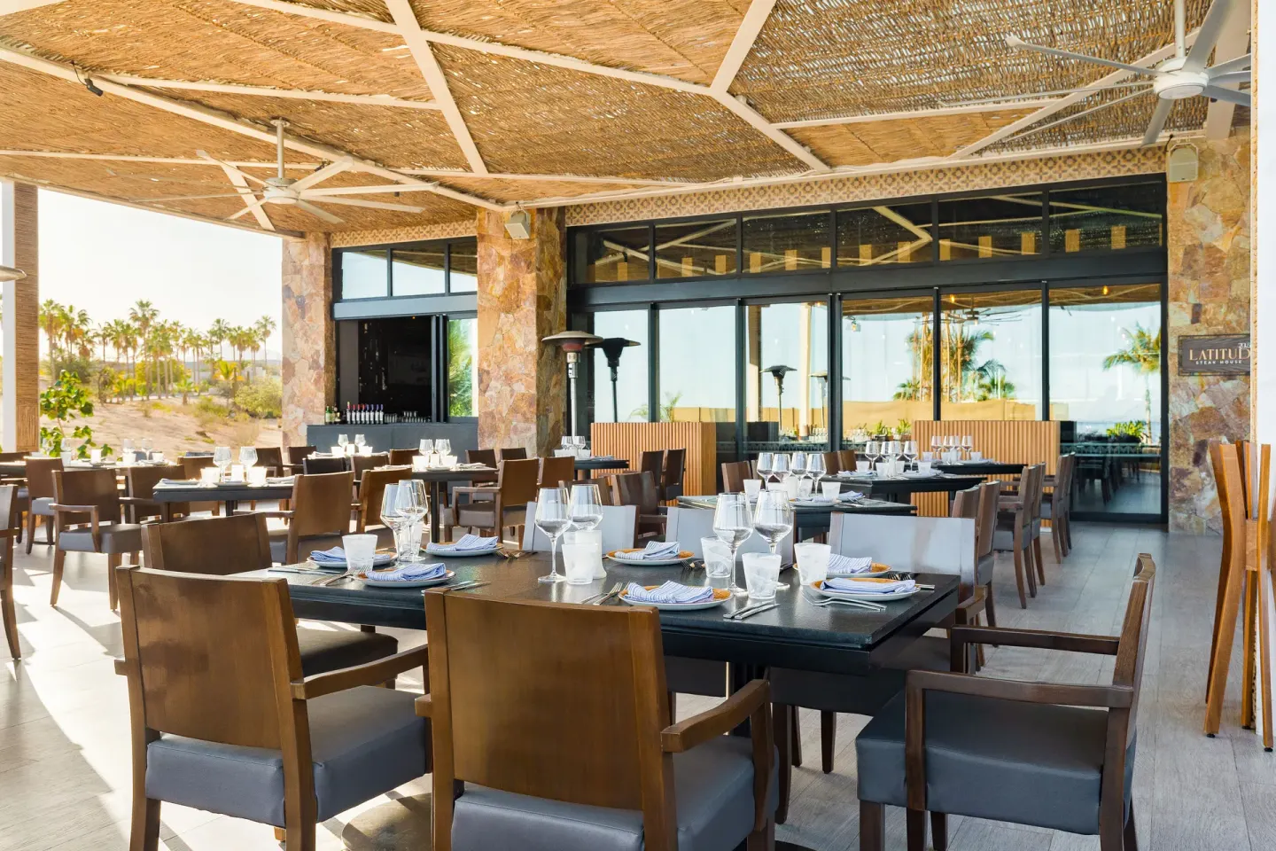 Latitud 23.5 terrace dining area at Villa La Valencia Los Cabos Beach Resort & Spa.