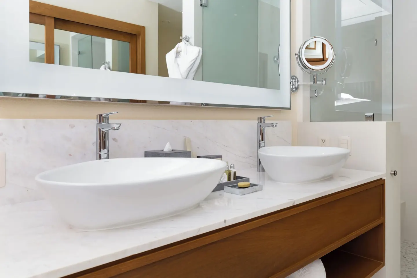 Double vessel sink vanity in a Deluxe Studio bathroom at Villa La Valencia Los Cabos Beach Resort & Spa.