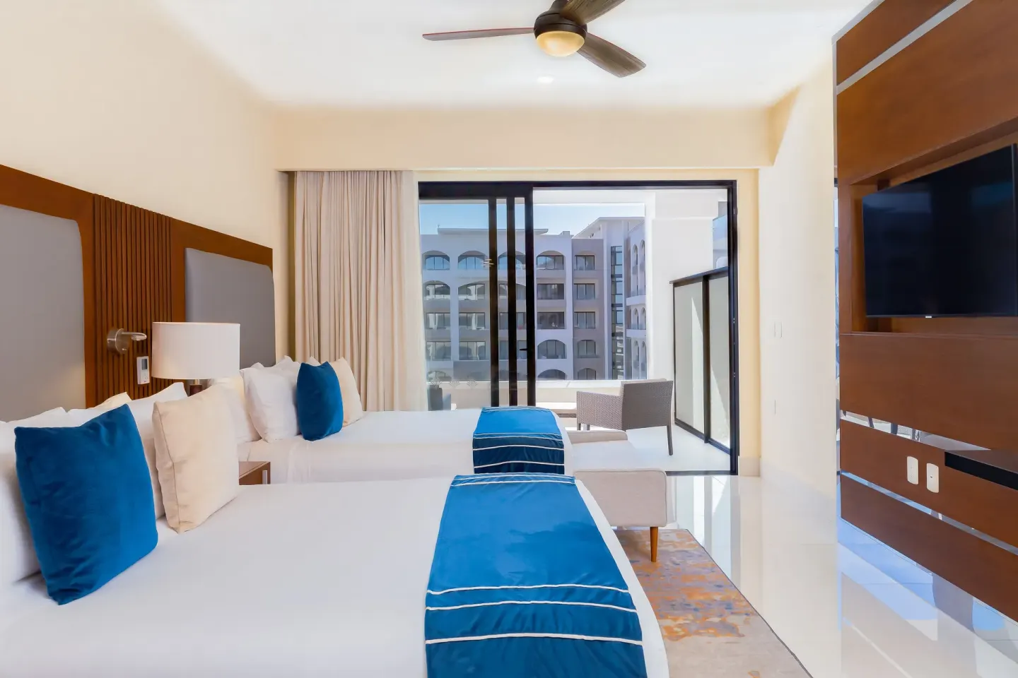 Deluxe Studio Pool View with two beds and balcony at Villa La Valencia Los Cabos Beach Resort & Spa.