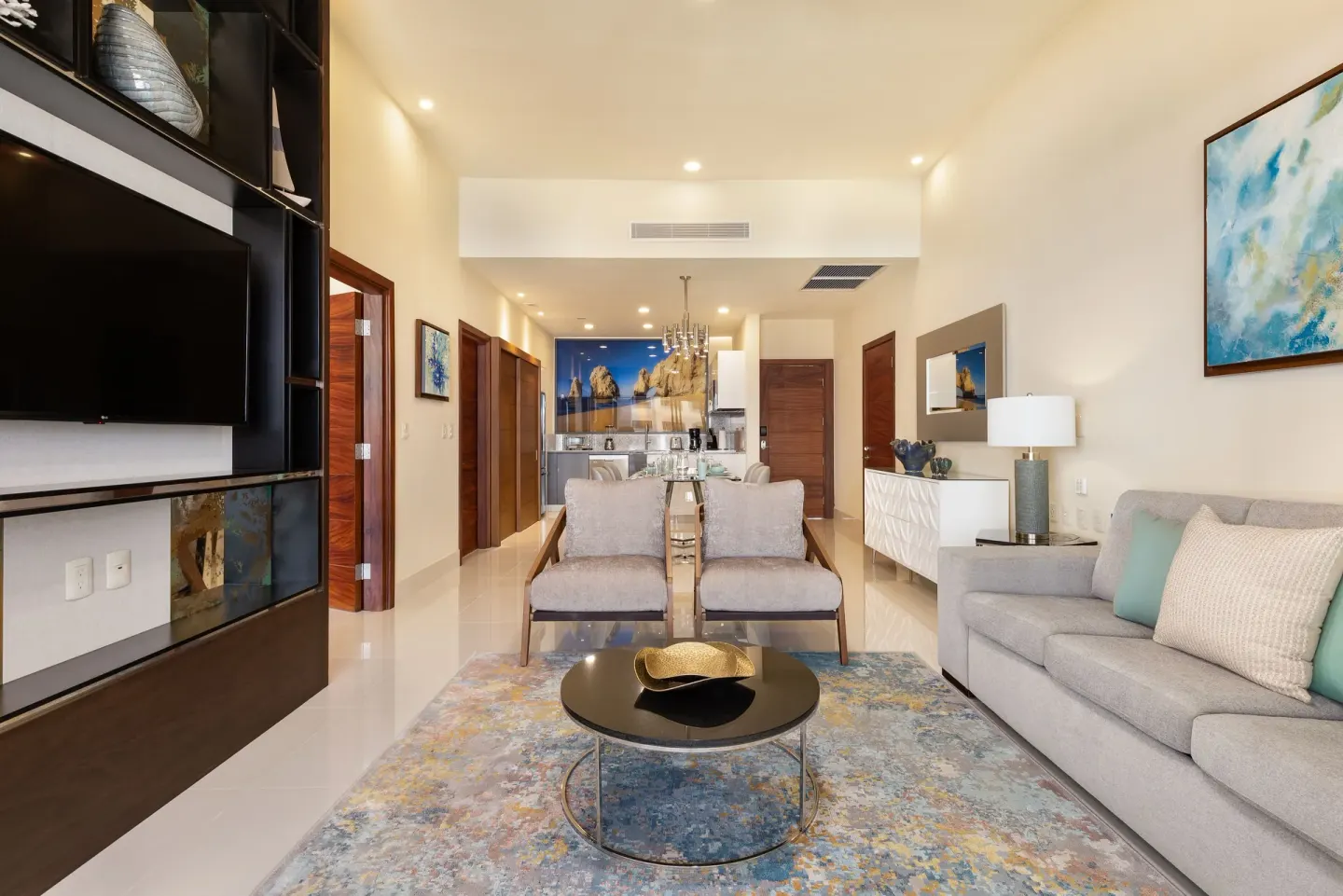 Living room looking toward the dining area in a One Bedroom Suite Pool View at Villa La Valencia Los Cabos Beach Resort & Spa