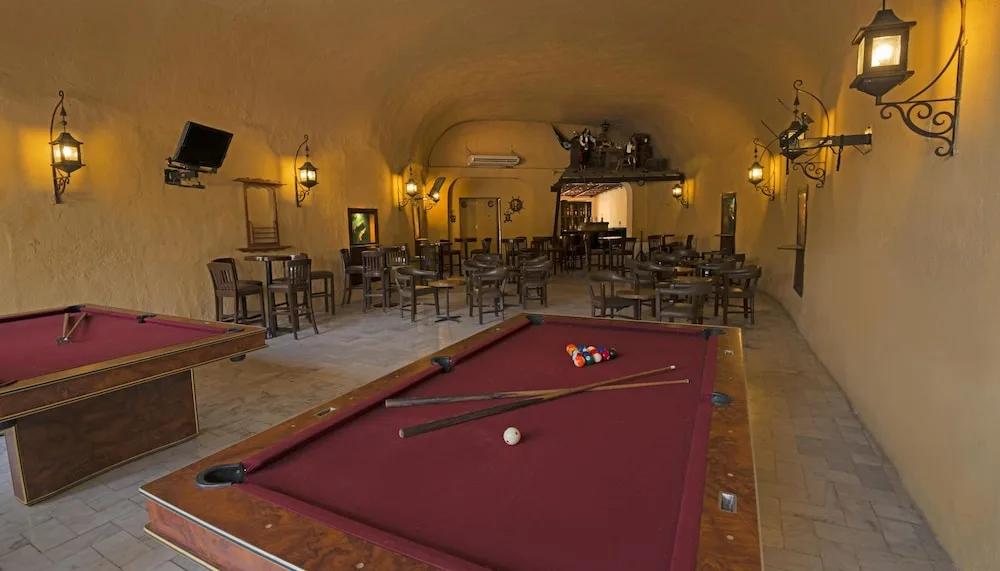 Indoor bar with pool tables at Vista Playa de Oro Manzanillo.