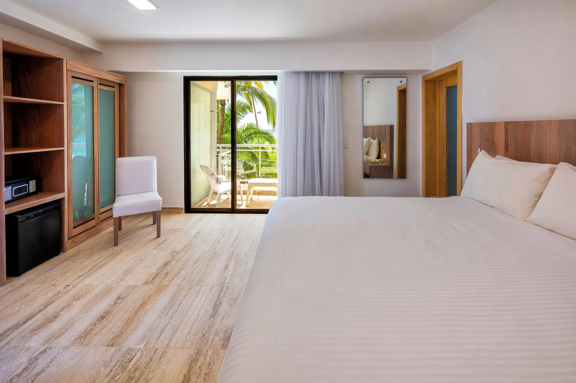 Superior Ocean View room with king bed and balcony at Viva Dominicus Palace.