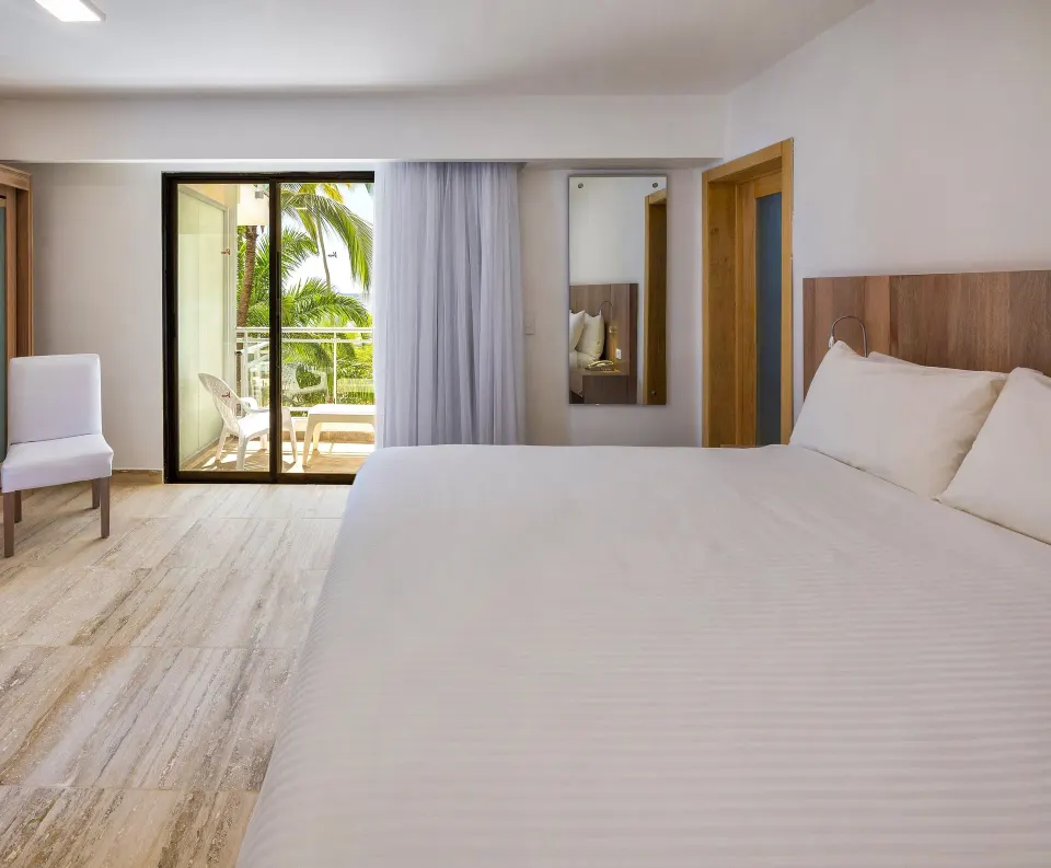 Superior Ocean View king room with balcony seating at Viva Dominicus Palace.