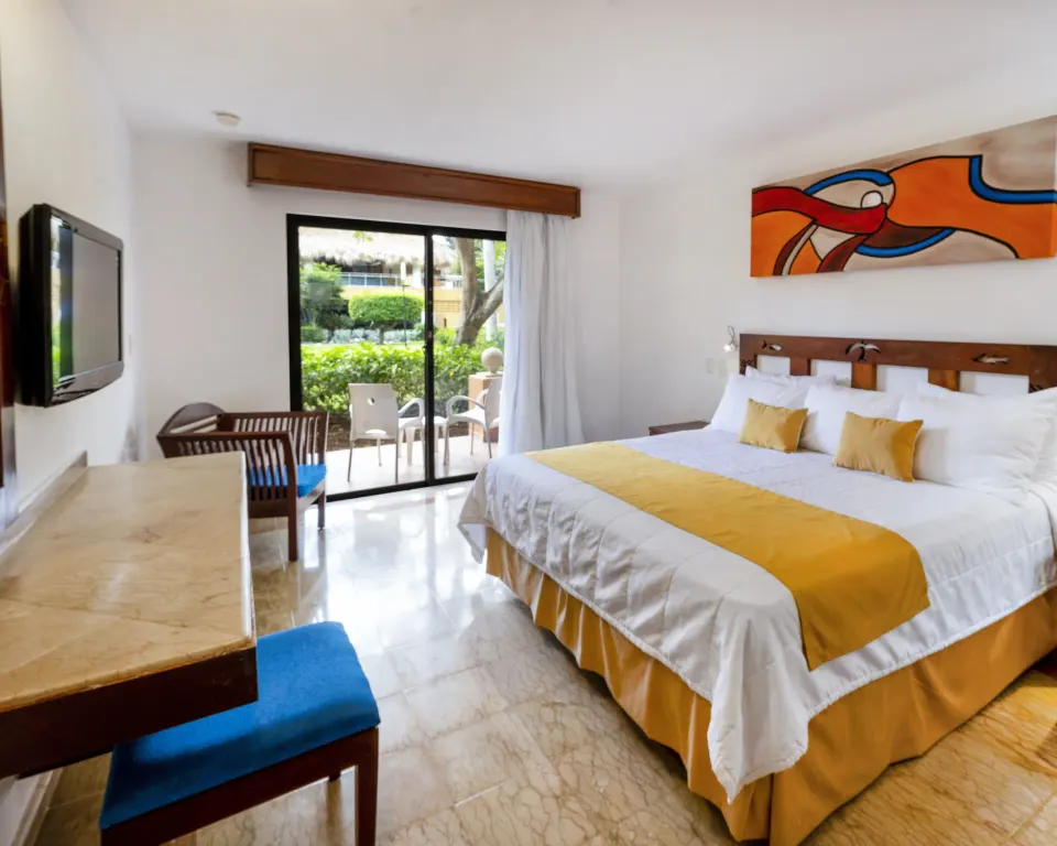 Superior non-smoking king room with desk and garden patio at Viva Dominicus Palace.