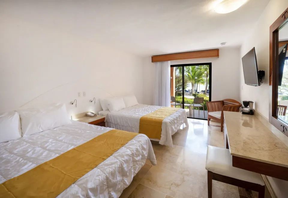 Superior non-smoking room with two beds and counter area at Viva Dominicus Palace.