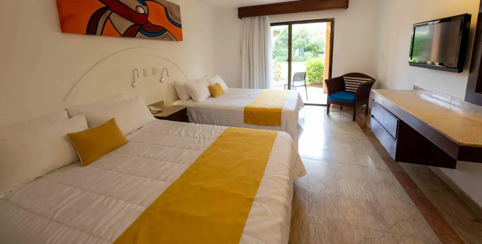 Superior non-smoking room with two beds and patio at Viva Dominicus Palace.