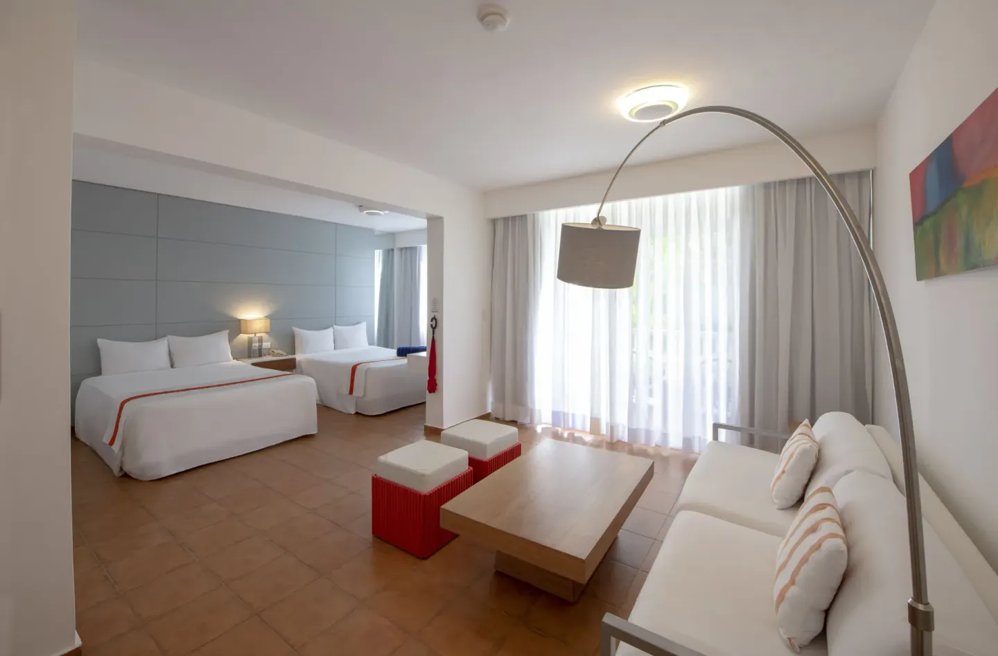 Amnesia room with two beds and living area at Viva Heavens.