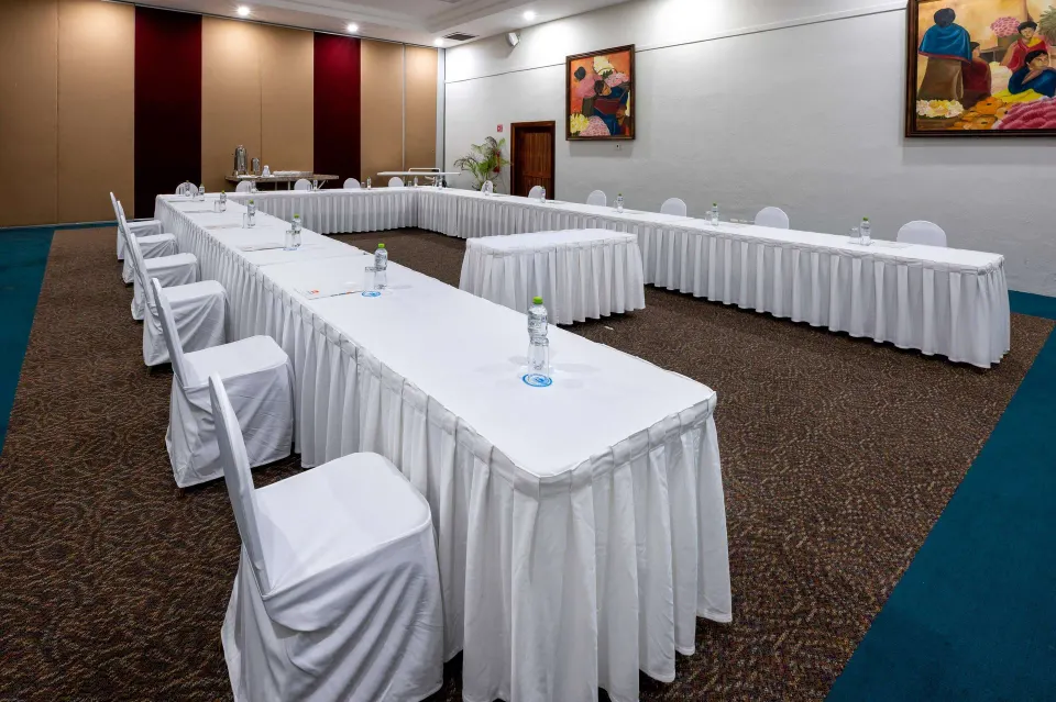 Alternate view of the resort meeting room with U-shaped tables at Viva Maya