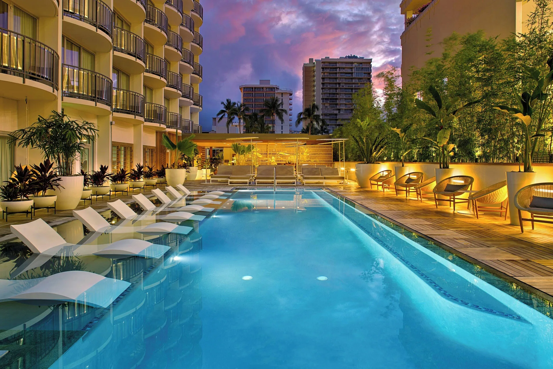 The Laylow Waikiki boutique hotel with midcentury design pool deck and central Waikiki location