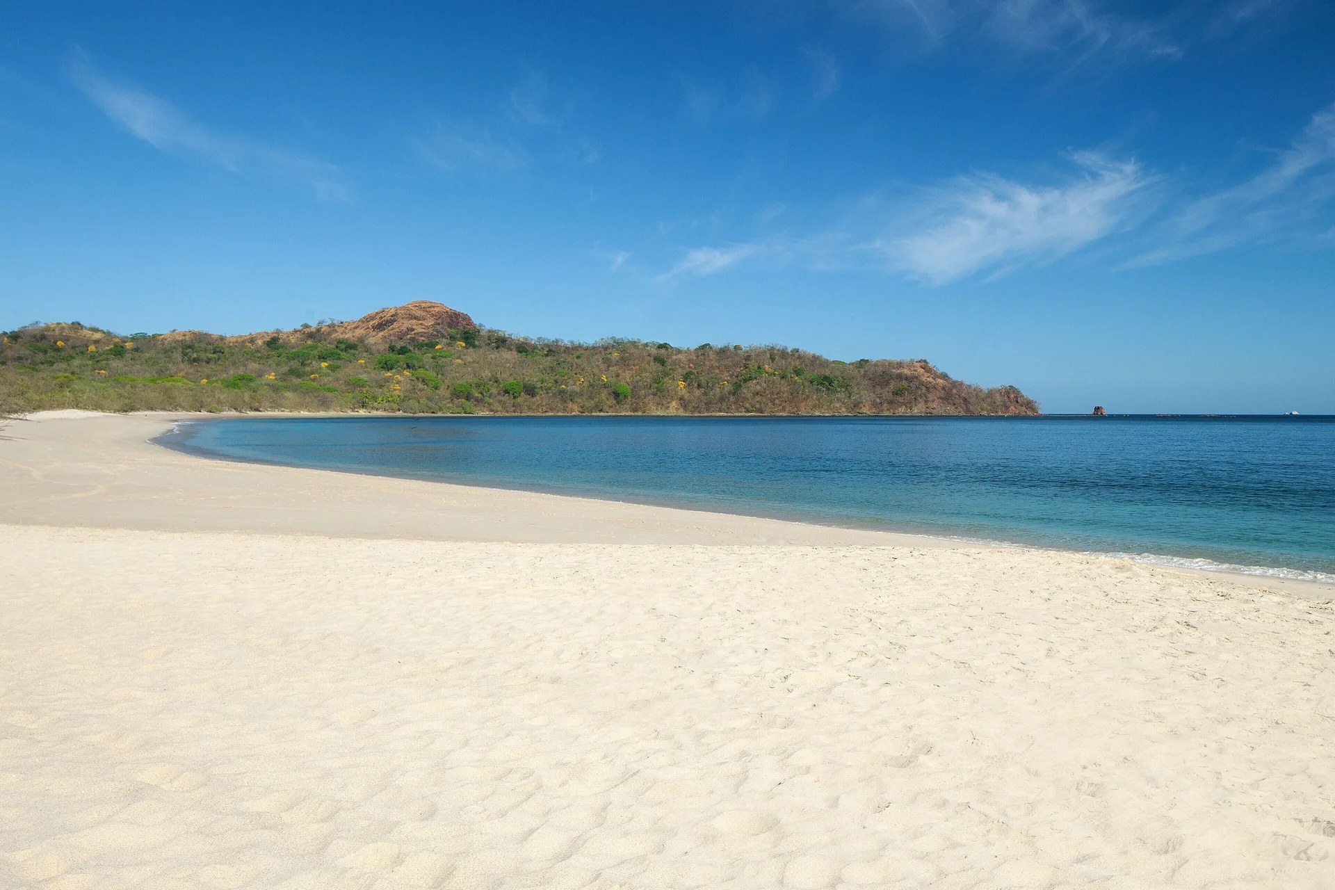 Sandy beach and calm blue bay at W Costa Rica - Reserva Conchal