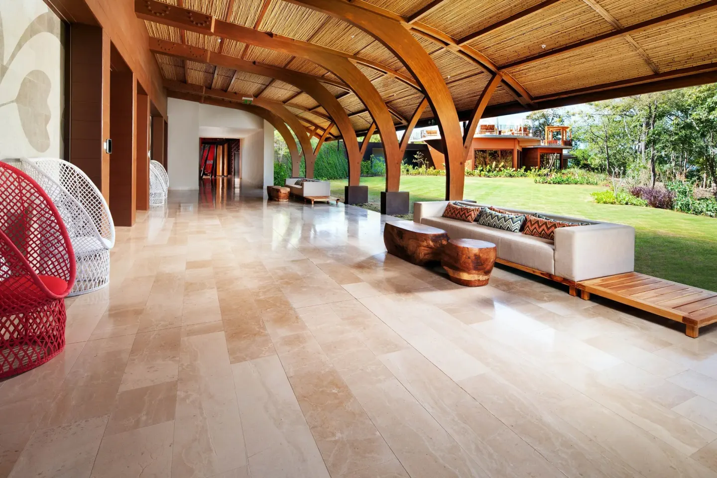 Covered resort walkway and lounge seating at W Costa Rica - Reserva Conchal.