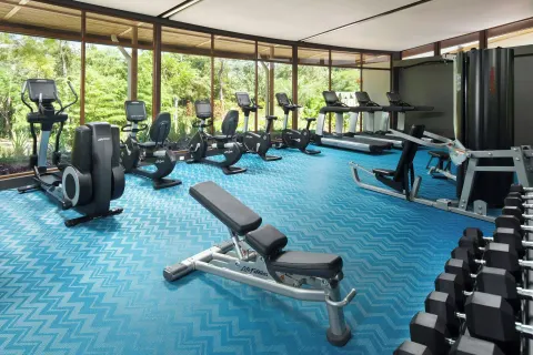 Fitness center with cardio machines and weights at W Costa Rica - Reserva Conchal.