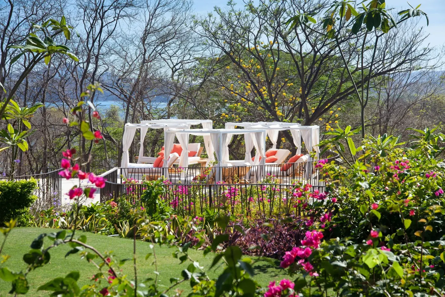 Garden cabanas with ocean glimpses through the trees at W Costa Rica - Reserva Conchal.