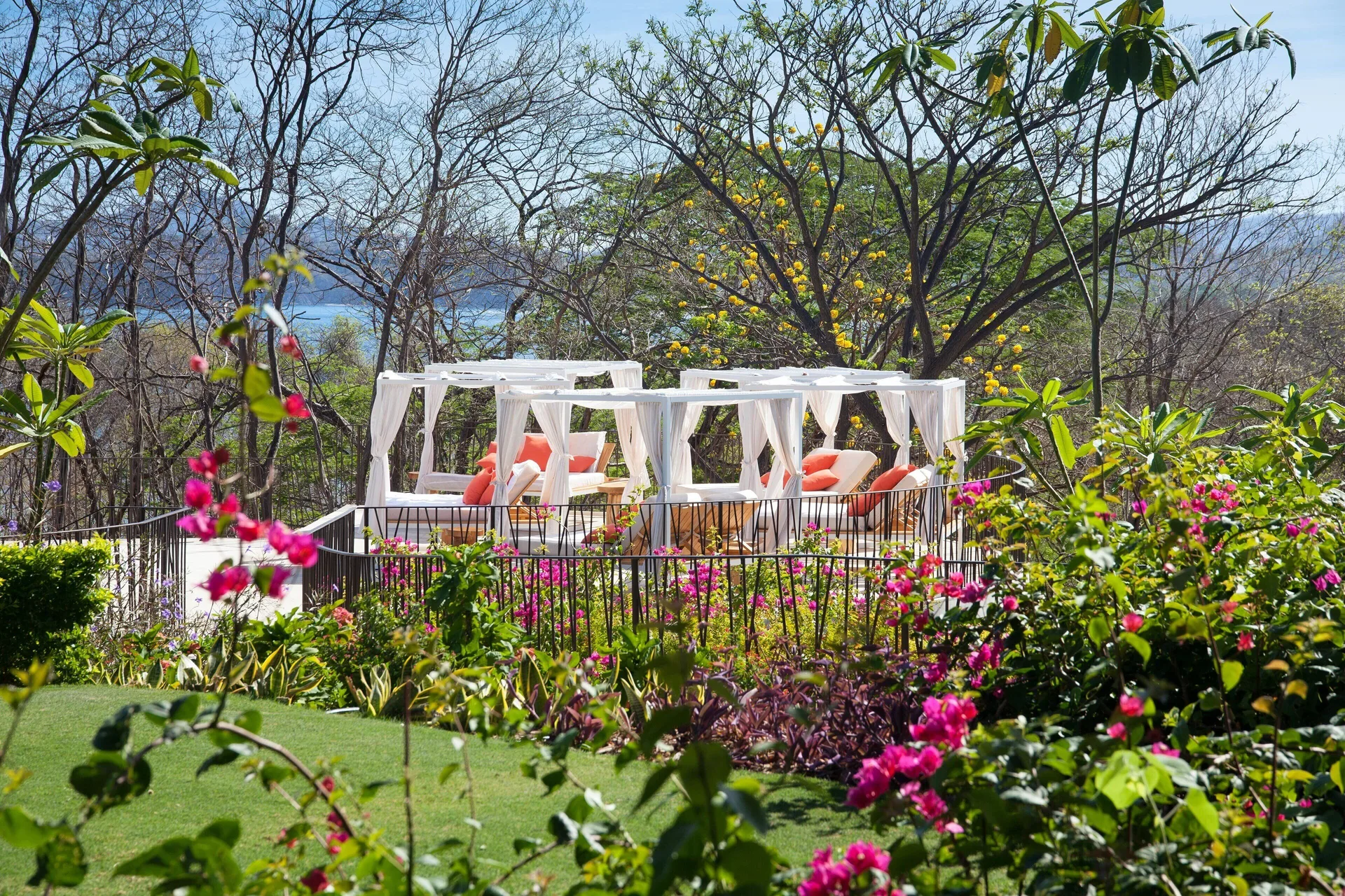 Garden cabanas with ocean glimpses through the trees at W Costa Rica - Reserva Conchal.
