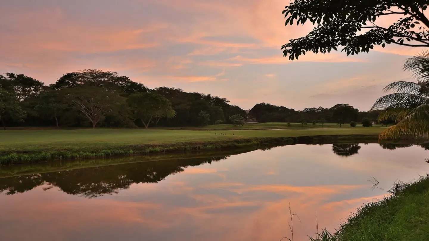 Sunset reflected in a resort lagoon at W Costa Rica - Reserva Conchal.