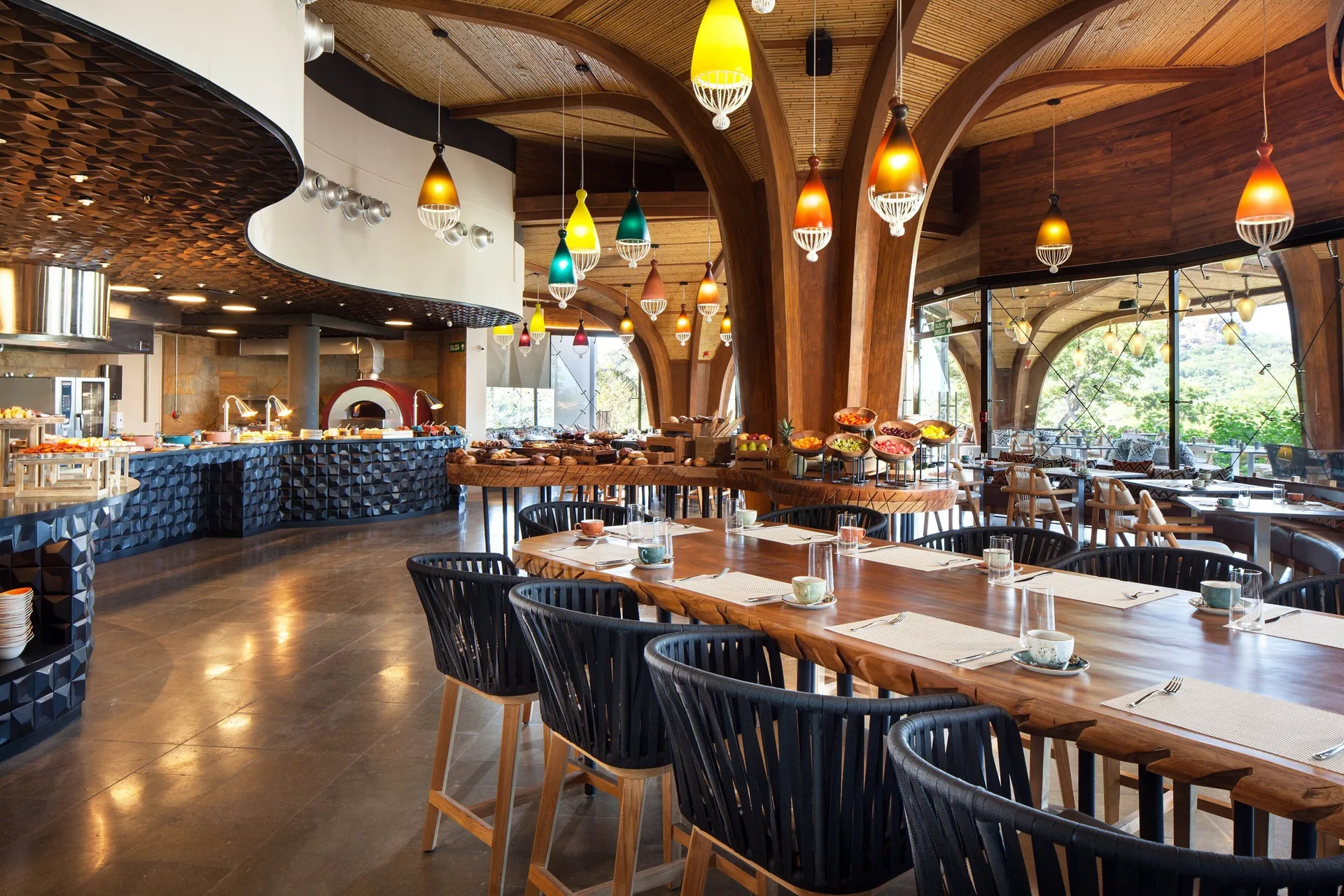 Market-style restaurant seating and buffet counters at W Costa Rica - Reserva Conchal.