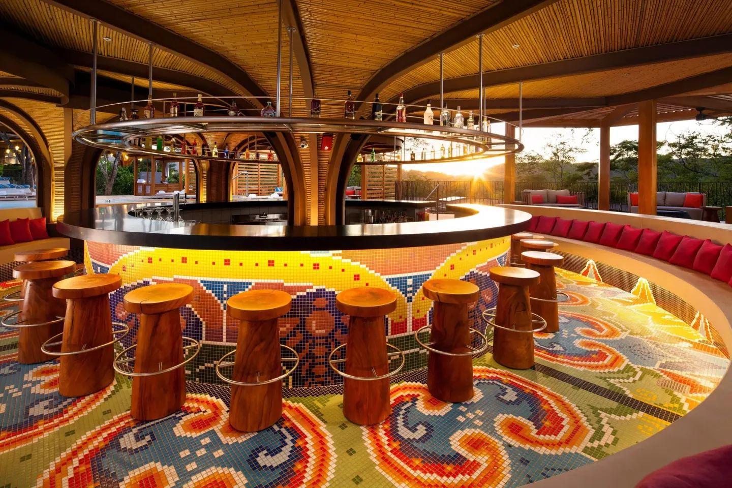 Open-air circular poolside bar with mosaic tile at W Costa Rica - Reserva Conchal.