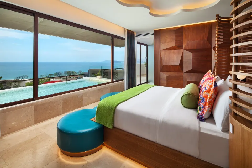 Ocean-view bedroom in a two-bedroom corner suite at W Costa Rica - Reserva Conchal.