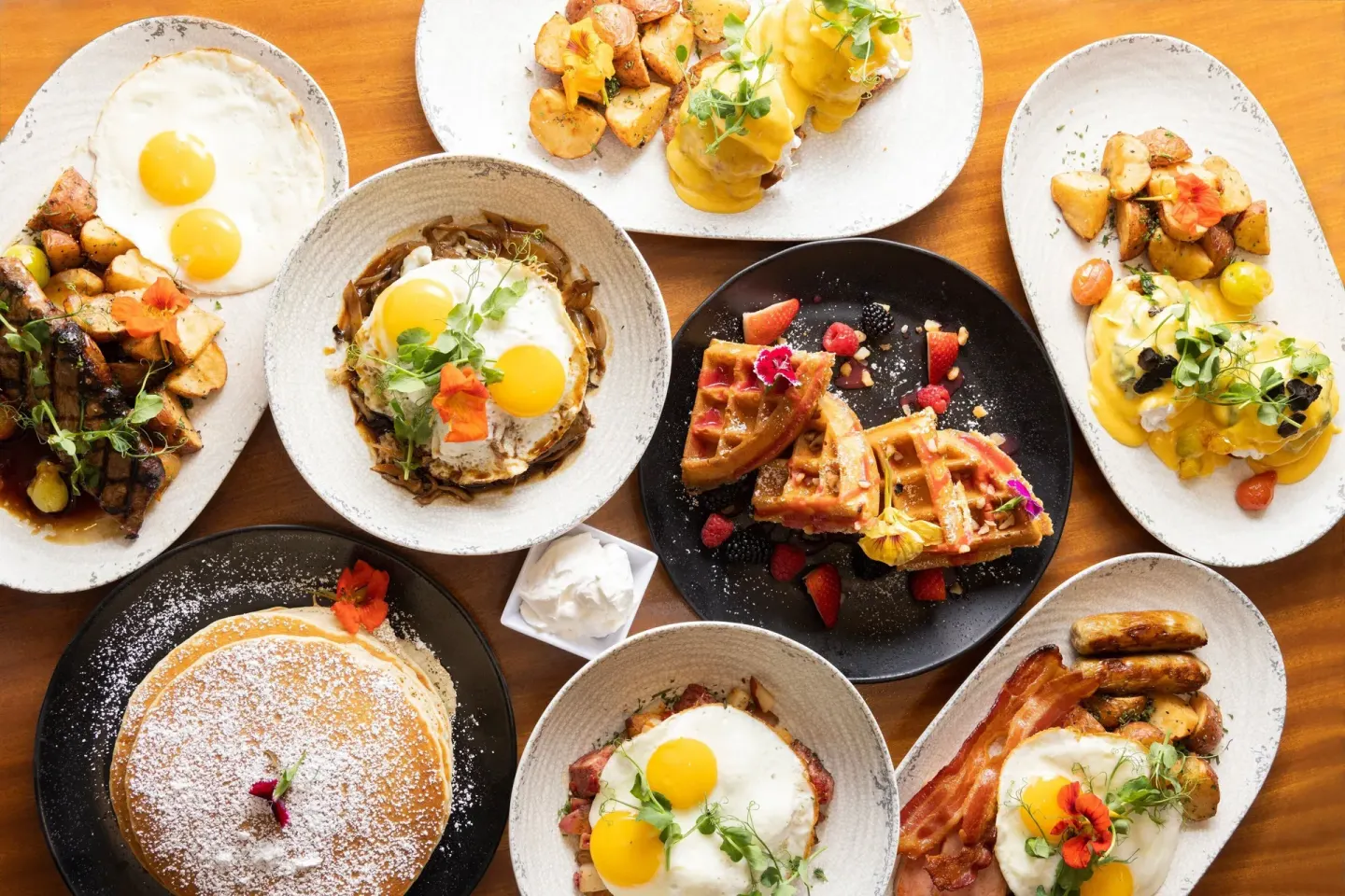 Assorted breakfast plates on a table at Waikiki Beach Marriott Resort & Spa.