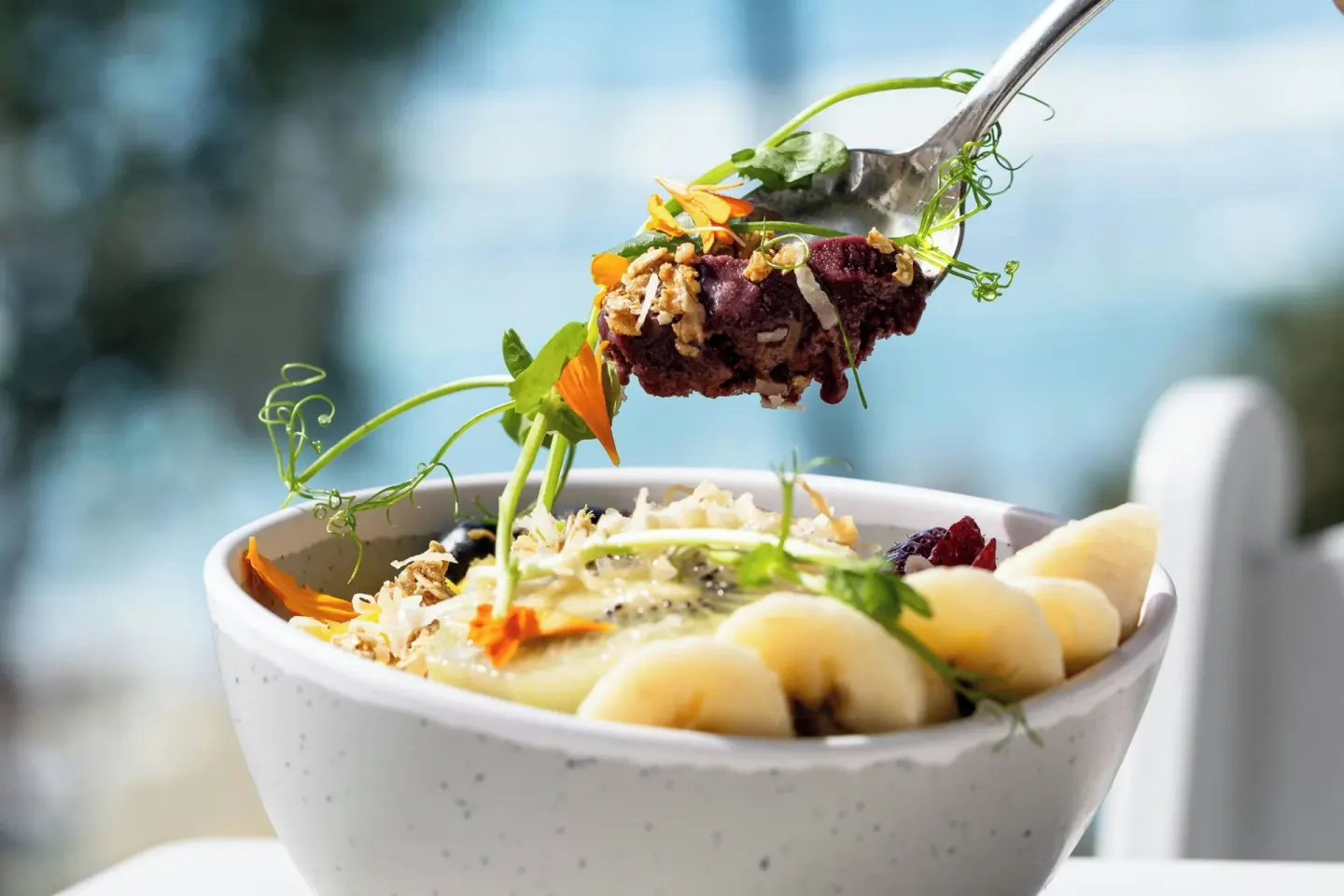 Fruit smoothie bowl with spoon at Waikiki Beach Marriott Resort & Spa.