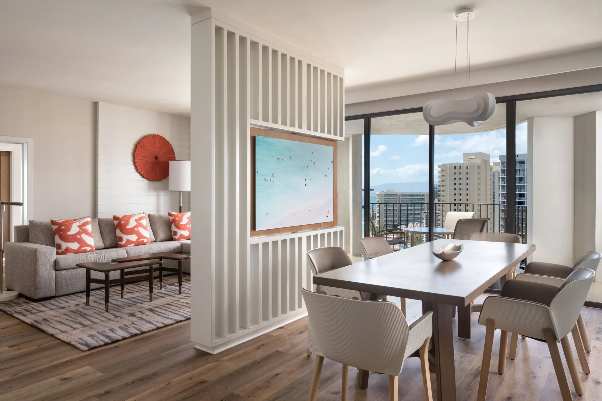 Deluxe One-Bedroom Suite dining and sitting areas at Waikiki Beach Marriott Resort & Spa.